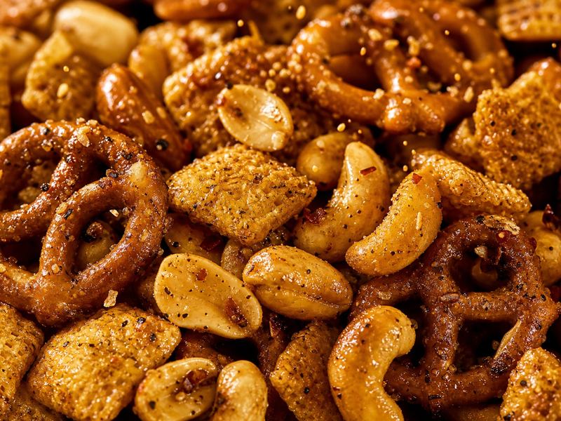 Close-up of seasoned snack mix with pretzels and nuts